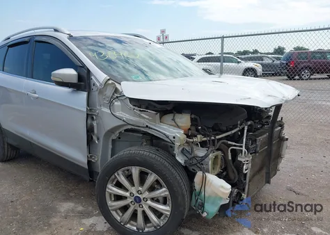 2017 Ford Escape Titanium from USA, damaged, VIN 1FMCU0J95HUE94399